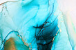 Luxury emerald abstract background in alcohol ink technique, aquamarine gold liquid painting, scattered acrylic blobs and swirling stains, blue green printed materials
