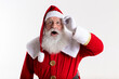 © Brastock Images - Santa Claus in eyeglasses is looking surprised at camera on white background