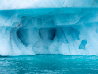 photo of mountain, glacier, sea ice, ocean and icebergs in the canadian arctic