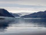 Fototapeta Natura - photo of mountain, glacier, sea ice, ocean and icebergs in the canadian arctic