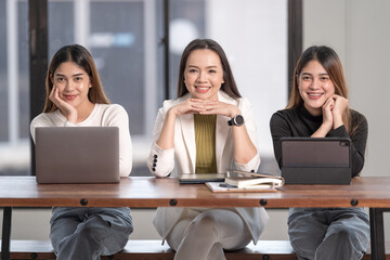 Poster - Horizontal shot of three Asian beautiful females posing with a smiles