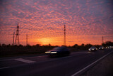Fototapeta Na sufit - fiery sunset along the highway