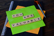 © farzand01 - you are valuable, text words typography on wooden background, life and business motivational inspirational concept