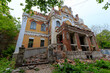 Destruction of a historic building in Russia. The ruined mansion stands on a hillock in the center of the city.