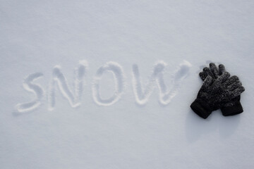 lettering on the snow on a snowy sunny day