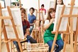 © Krakenimages.com - Group of young draw students smiling happy drawing at art studio.