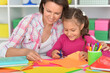 © aletia2011 - Mother teaches her cute daughter to do craft items