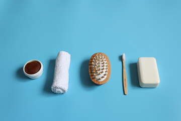 Poster - Spa composition with bath accessories on a blue background, top view.