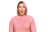 © Krakenimages.com - Hispanic woman with pink hair wearing casual winter sweater making fish face with lips, crazy and comical gesture. funny expression.