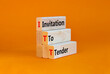 ITT invitation to tender symbol. Concept words ITT invitation to tender on blocks on a beautiful orange table, orange background. Business and ITT invitation to tender concept. Copy space.