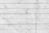 Fototapeta Sypialnia - Background of weathered white planks, bright worn surface texture as graphic design element