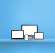 © daboost - Computer, laptop, mobile phone and digital tablet pc. blue shelf background