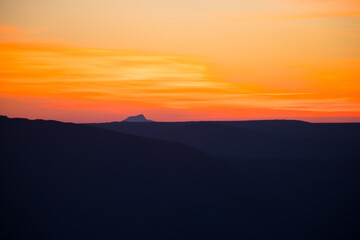 Wall Mural - Colorful sunset over the mountain hills. Beautiful landscape in Azerbaijan nature.