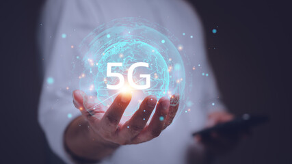 Fototapete - Global network connection 5G on hand business man. concept of future technology 5G network wireless systems and internet of things or IOT. new technologies coming up in the future.