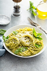 Wall Mural - Basil pesto pasta with parmesan and olive oil