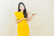 © siraphol - Portrait beautiful young asian woman smile with empty plate dish