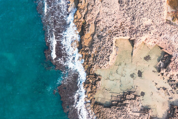  Aerial view of waves splashing on beach