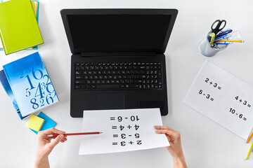 Wall Mural - distant education, school and people concept - hands of math teacher with laptop computer and mathematics having online class at home