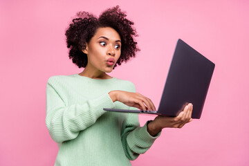 Portrait of impressed pretty dark skin person pouted lips unbelievable reaction isolated on pink color background