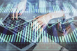 © peshkova - Double exposure of woman hands working on computer and data theme hologram drawing. Tech concept.