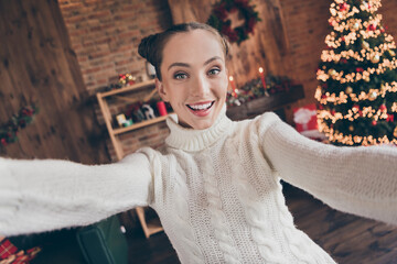 Canvas Print - Photo of adorable funny young woman dressed knitted sweater recording self video smiling indoors room home house