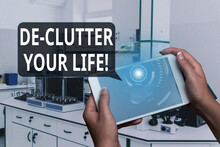 Text Caption Presenting De Clutter Your Life. Business Concept Remove Unnecessary Items From Untidy Or Overcrowded Places Man In Uniform Standing Holding Tablet Typing Futuristic Technologies.