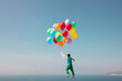 © VISTA by Westend61 - Boy flying with bunch of balloons in sky