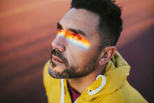 Mature Man With Spectrum On Eyes While Looking Away