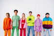 © VISTA by Westend61 - Stylish men and women in colorful clothes looking at camera against white background