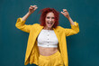 © VISTA by Westend61 - Young woman with red curly hair having fun singing and dancing