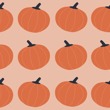 Abstract Orange Pumpkins Hand Drawn Vector Illustration. Seasonal Vegetables Harvest On A Pink Background. Colorful Halloween Print. Autumn Seamless Pattern.