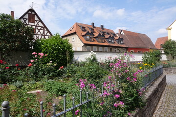 Poster - Blumen an der Kirche in Eibelstadt