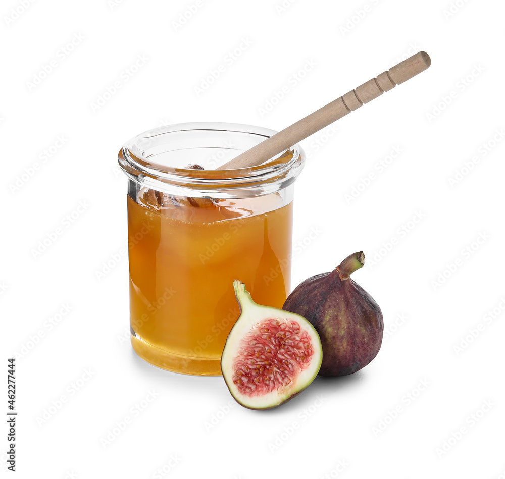 Glass jar with honey and ripe figs on white background