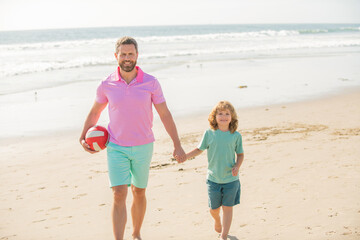 childhood and parenting. family holidays. sport activity. positive father and son walk