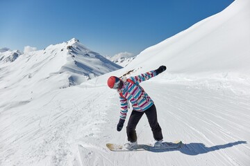 Sticker - Female snowboarder in the Alps, sunny mountain landscape