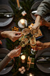 © Seventyfour - Top view background of four people enjoying Christmas dinner together and toasting with champagne glasses while sitting by elegant dining table with candles