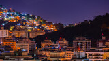 Fototapeta Las - Niterói, Rio de Janeiro, Brazil - CIRCA 2021: Long exposure urban night photography with buildings and lights of a Brazilian city