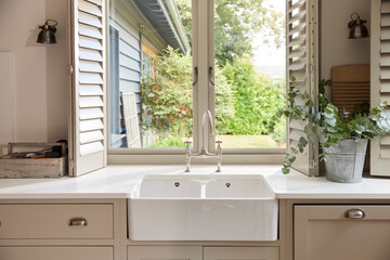 Domestic kitchen with clean sink and countertop