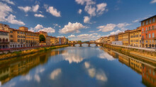 Florence, Italy, City Of Art And Monuments, Frequented By Tourists, Overlooking One Of Florence's Bridges	