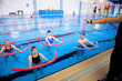 Aqua aerobics training in the water sports center.