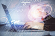 © peshkova - Multi exposure of woman hands working on computer and data theme hologram drawing. Tech concept.