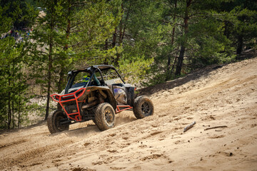 Wall Mural - UTV, ATV, 4x4 off road vehicle in sandy open area. Buggy extreme riding