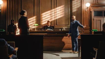 Wall Mural - Court of Law Trial in Session: Charismatic Male Public Defender Making Touching, Passionate Speech to Judge and Jury. Female Prosecutor Objecting to His Arguments and Delivering Her Accusations.