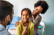 © NDABCREATIVITY - Healthcare medical exam people child concept. Close up of happy girl and doctor with stethoscope