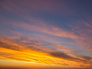 Wall Mural - beautiful sunset on dramatic stormy red sky