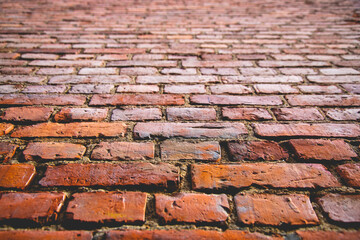 Canvas Print - Low angle shot of a brick wall background