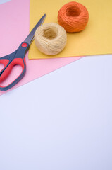 Poster - decoration yarn felt sheet and scissors on a bright wooden background