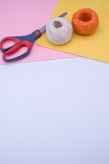 Poster - decoration yarn felt sheet and scissors on a bright wooden background