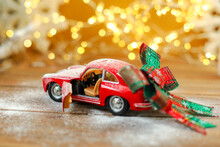 Christmas Toy Car On The Snow, Red Car, Car With Bow