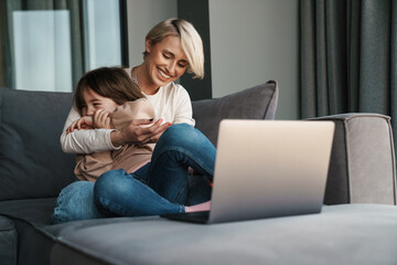 Canvas Print - Happy young mother and her little daughter